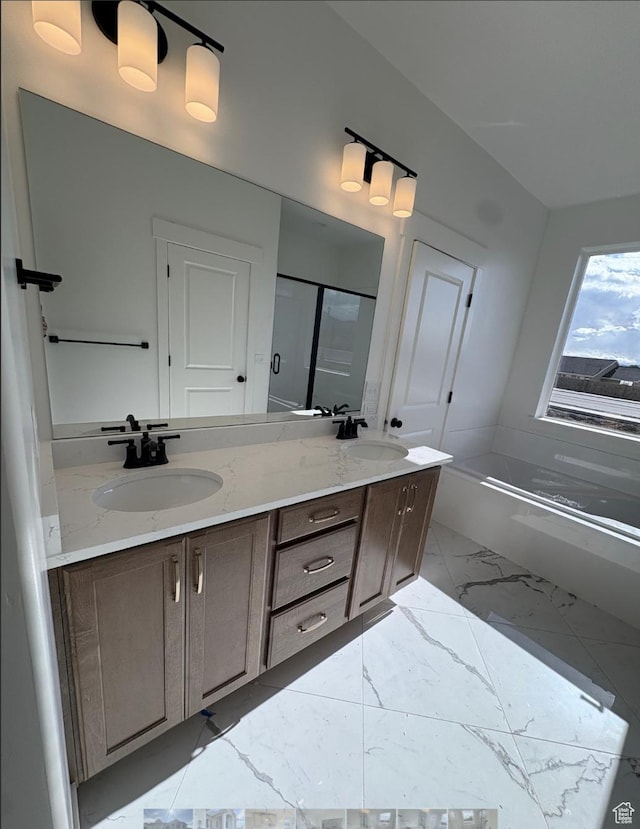 285 N 990 E Unit 13, Salem, UT 84653 - full bath featuring double vanity, marble look tiles, a stall shower, and a bathtub