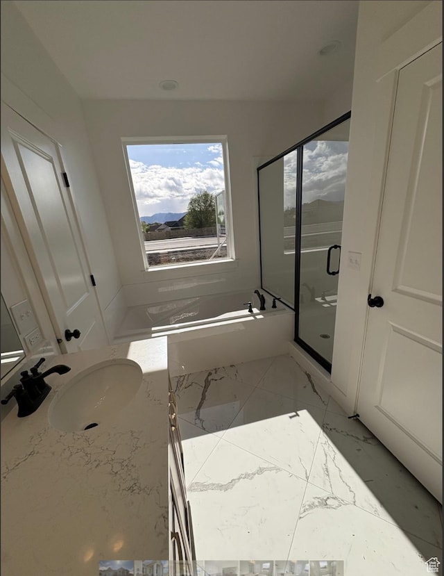 285 N 990 E Unit 13, Salem, UT 84653 - full bathroom featuring marble look tile flooring, a stall shower, a bath, and vanity