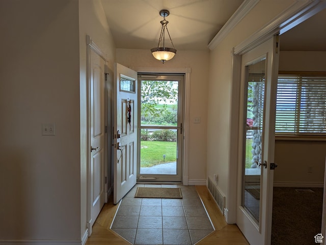 565 E Platt Ln Unit 1, Mona, UT 84645 - foyer entrance featuring french doors, a wealth of natural light, visible vents, and baseboards