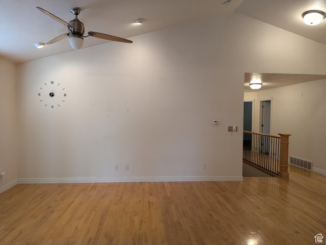 565 E Platt Ln Unit 1, Mona, UT 84645 - unfurnished room featuring lofted ceiling, baseboards, ceiling fan, visible vents, and light wood-type flooring
