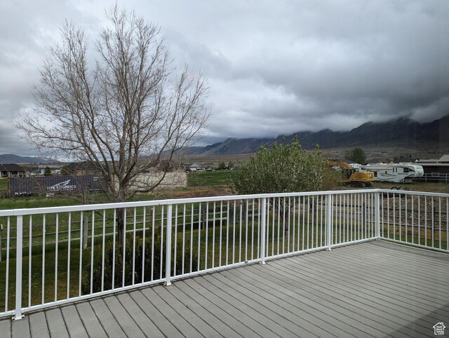 565 E Platt Ln Unit 1, Mona, UT 84645 - wooden deck featuring a mountain view