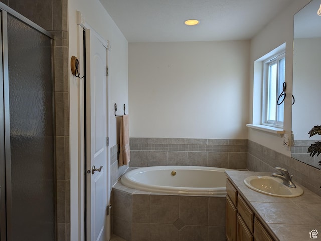 565 E Platt Ln Unit 1, Mona, UT 84645 - full bath with a shower stall, vanity, recessed lighting, and a bath