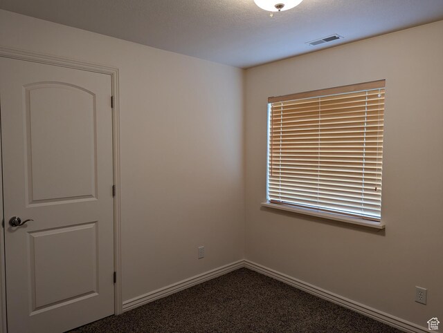 565 E Platt Ln Unit 1, Mona, UT 84645 - unfurnished room with carpet flooring, baseboards, and visible vents