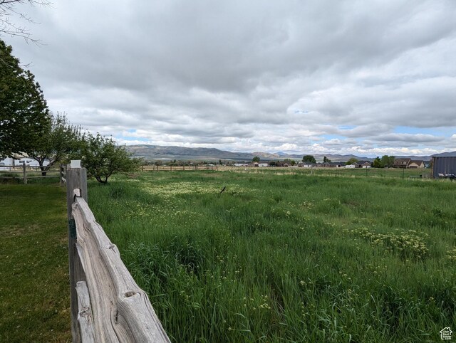 565 E Platt Ln Unit 1, Mona, UT 84645 - view of yard featuring a rural view and a mountain view