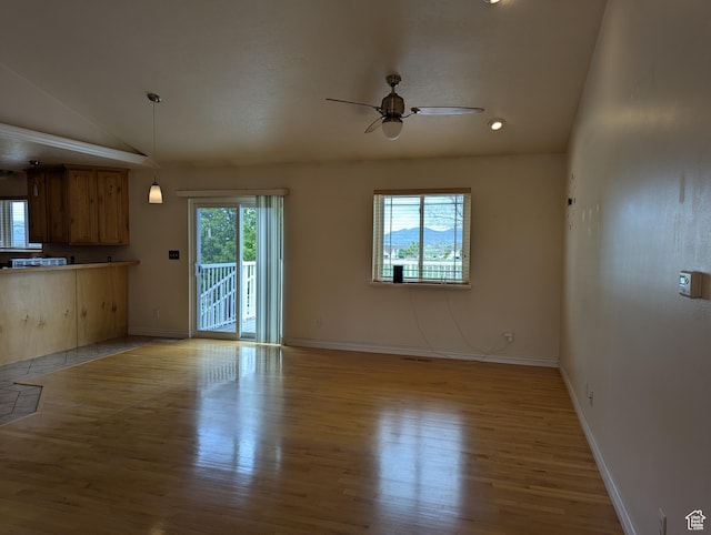 565 E Platt Ln Unit 1, Mona, UT 84645 - unfurnished living room with lofted ceiling, wood finished floors, recessed lighting, a ceiling fan, and baseboards