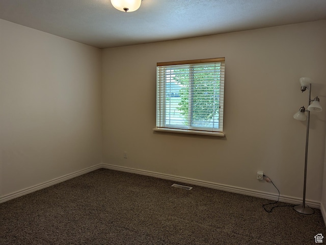 565 E Platt Ln Unit 1, Mona, UT 84645 - unfurnished room featuring carpet flooring, visible vents, and baseboards