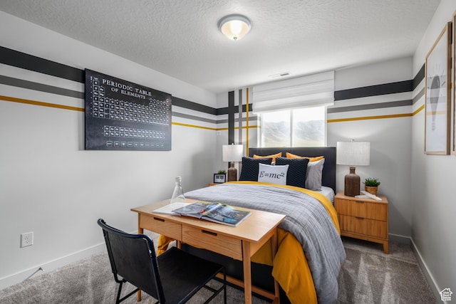 bedroom with baseboards, carpet flooring, visible vents, and a textured ceiling