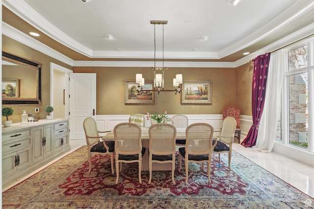 2428 E Field Rose Dr, Holladay, UT 84121 - dining room featuring ornamental molding, a decorative wall, and a wainscoted wall