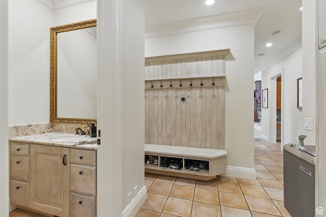 2428 E Field Rose Dr, Holladay, UT 84121 - mudroom featuring a sink, ornamental molding, light tile patterned floors, and recessed lighting