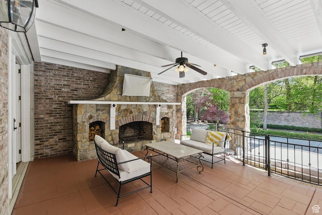 2428 E Field Rose Dr, Holladay, UT 84121 - view of patio / terrace featuring an outdoor stone fireplace and a ceiling fan