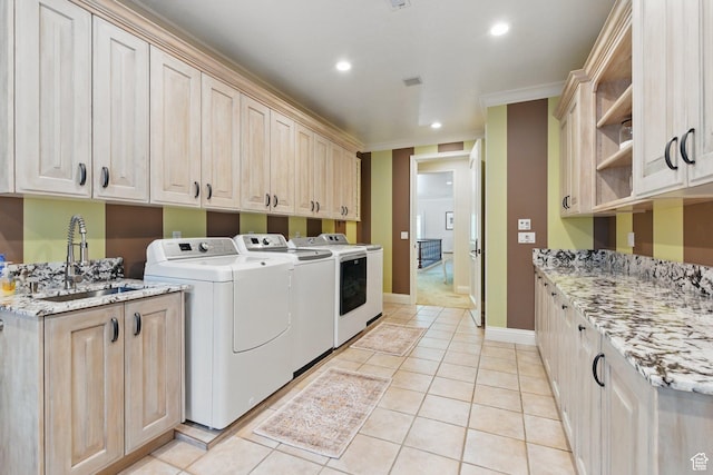 2428 E Field Rose Dr, Holladay, UT 84121 - washroom with a sink, cabinet space, recessed lighting, separate washer and dryer, and light tile patterned floors