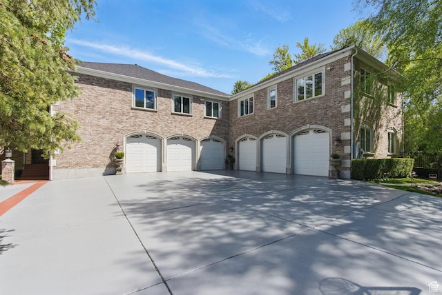 2428 E Field Rose Dr, Holladay, UT 84121 - view of front of home featuring concrete driveway and a garage