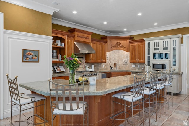 2428 E Field Rose Dr, Holladay, UT 84121 - kitchen with light tile patterned floors, a sink, wall chimney exhaust hood, stainless steel appliances, and brown cabinetry