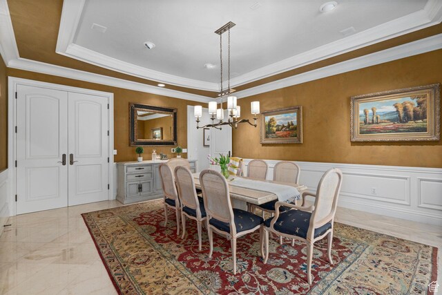 2428 E Field Rose Dr, Holladay, UT 84121 - dining room featuring a chandelier, ornamental molding, and a wainscoted wall