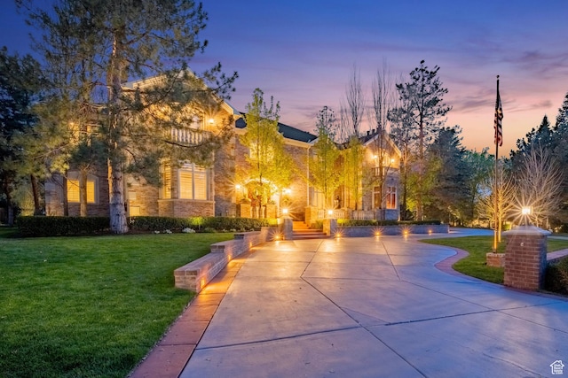2428 E Field Rose Dr, Holladay, UT 84121 - view of community with a yard and curved driveway