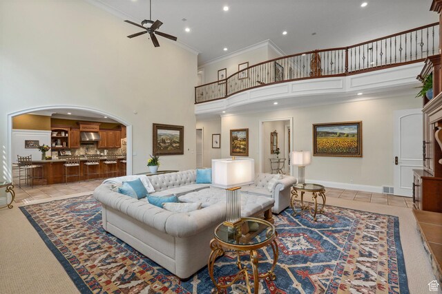 2428 E Field Rose Dr, Holladay, UT 84121 - living area featuring a ceiling fan, recessed lighting, visible vents, crown molding, and a high ceiling