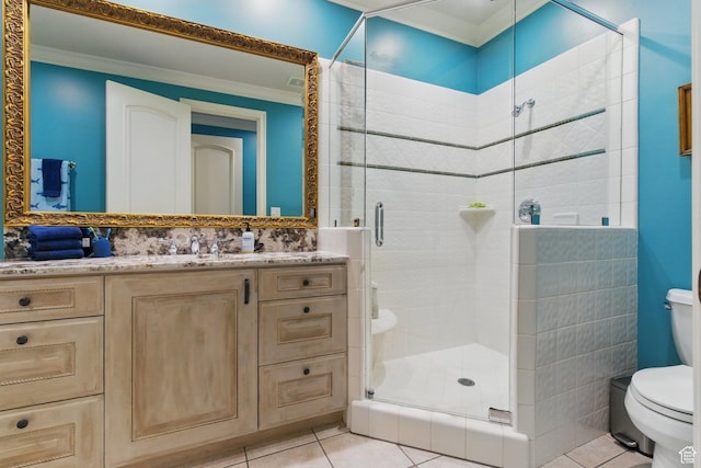 2428 E Field Rose Dr, Holladay, UT 84121 - full bathroom featuring a stall shower, toilet, ornamental molding, tile patterned floors, and vanity