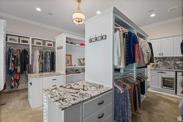 2428 E Field Rose Dr, Holladay, UT 84121 - spacious closet featuring wine cooler, washer / dryer, visible vents, and light colored carpet