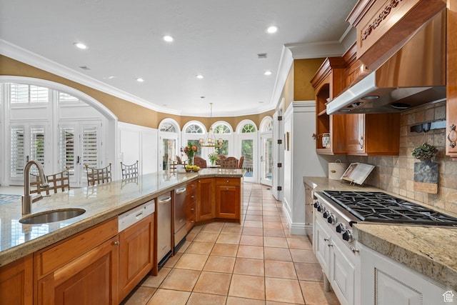 2428 E Field Rose Dr, Holladay, UT 84121 - kitchen featuring stainless steel gas cooktop, light tile patterned floors, range hood, a sink, and brown cabinets