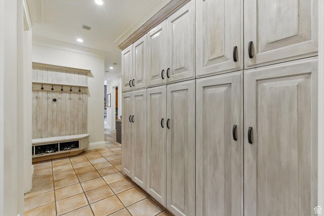 2428 E Field Rose Dr, Holladay, UT 84121 - mudroom with crown molding, light tile patterned floors, baseboards, and recessed lighting