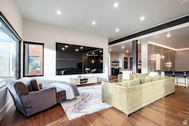 living area featuring recessed lighting and wood finished floors