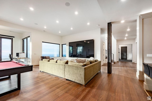 living area featuring hardwood / wood-style floors, pool table, recessed lighting, and baseboards