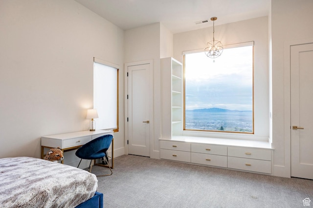 carpeted bedroom featuring a chandelier, visible vents, and multiple windows