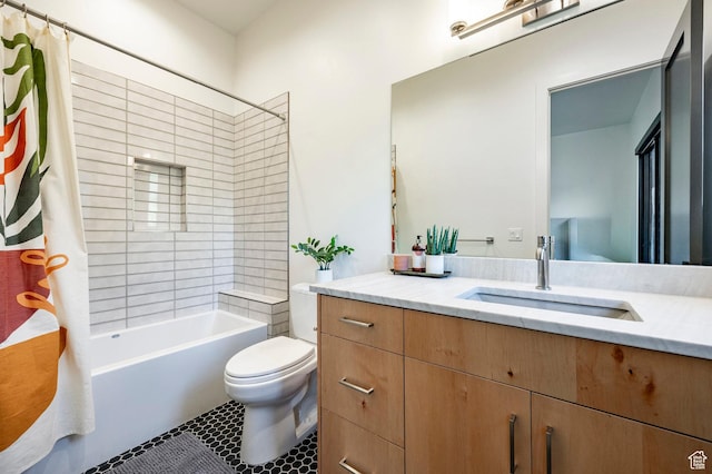 full bath with vanity, toilet, shower / bath combo, and tile patterned flooring
