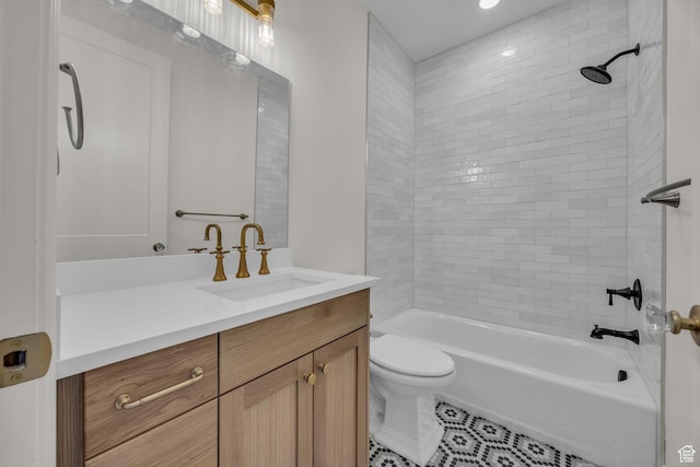 bathroom featuring bathing tub / shower combination, toilet, tile patterned floors, and vanity