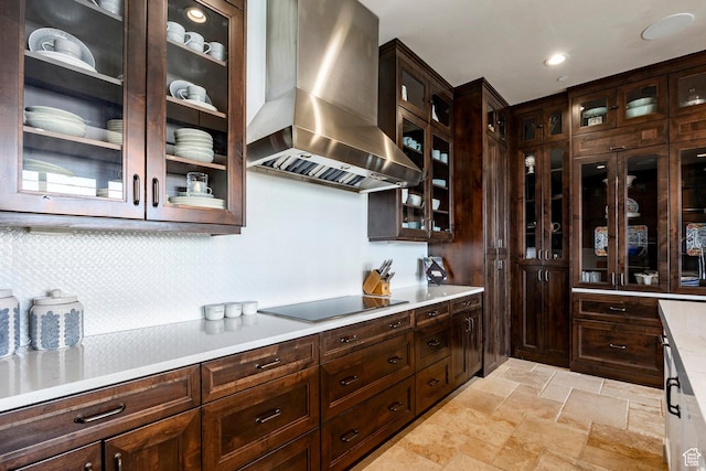 787 N Red Ledges Blvd, Heber City, UT 84032 - kitchen featuring stone tile flooring, exhaust hood, light countertops, decorative backsplash, and black electric stovetop