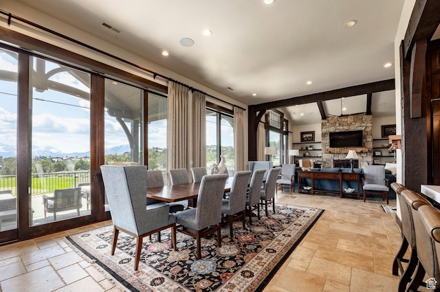 787 N Red Ledges Blvd, Heber City, UT 84032 - dining area featuring a mountain view, stone tile floors, visible vents, a stone fireplace, and recessed lighting