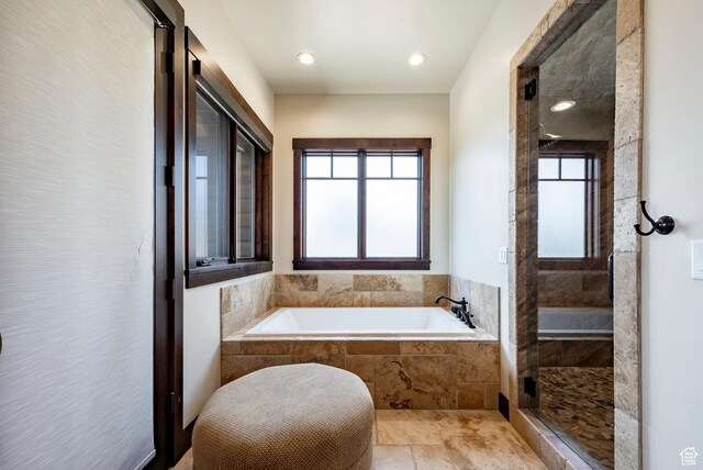 787 N Red Ledges Blvd, Heber City, UT 84032 - full bathroom featuring a bath, a stall shower, and a healthy amount of sunlight