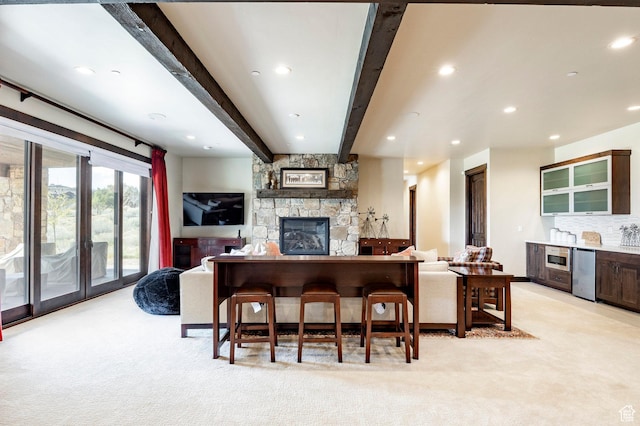 787 N Red Ledges Blvd, Heber City, UT 84032 - living room with beamed ceiling, a stone fireplace, recessed lighting, and light colored carpet