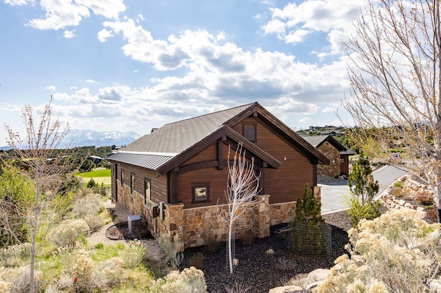 787 N Red Ledges Blvd, Heber City, UT 84032 - view of property exterior with stone siding and metal roof