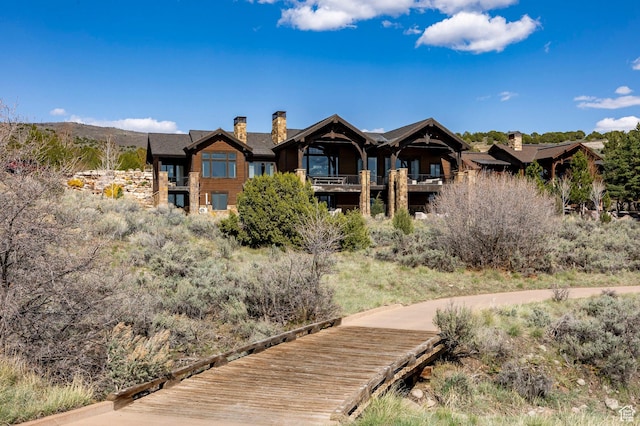 787 N Red Ledges Blvd, Heber City, UT 84032 - back of house with a chimney and a balcony