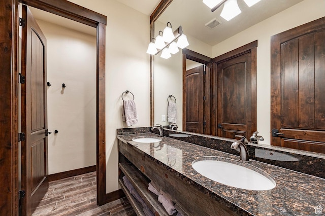 787 N Red Ledges Blvd, Heber City, UT 84032 - full bath featuring a sink, double vanity, visible vents, and wood finished floors