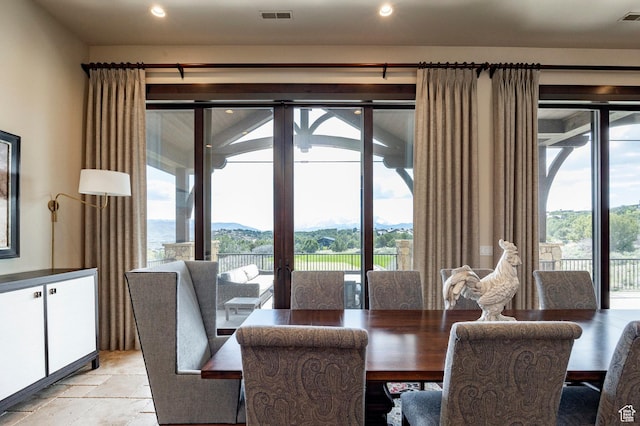 787 N Red Ledges Blvd, Heber City, UT 84032 - dining space featuring a mountain view, visible vents, stone tile floors, and recessed lighting