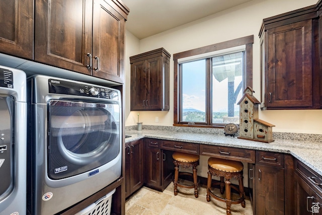 787 N Red Ledges Blvd, Heber City, UT 84032 - clothes washing area featuring cabinet space and stone finish floor
