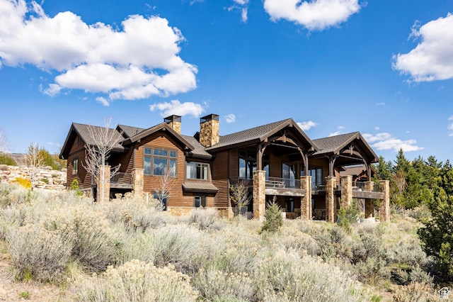 787 N Red Ledges Blvd, Heber City, UT 84032 - rear view of property with a chimney