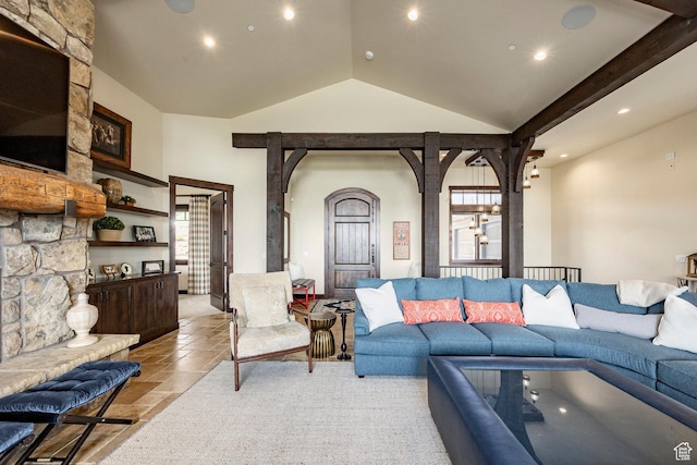 787 N Red Ledges Blvd, Heber City, UT 84032 - living room featuring arched walkways, stone tile flooring, recessed lighting, and vaulted ceiling