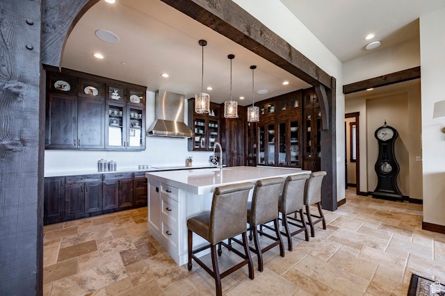 787 N Red Ledges Blvd, Heber City, UT 84032 - bar featuring recessed lighting, stone tile flooring, hanging light fixtures, wall chimney exhaust hood, and backsplash