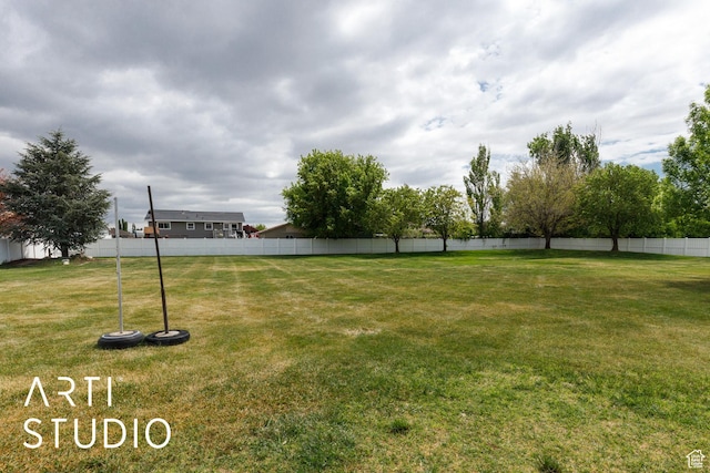 view of yard with fence