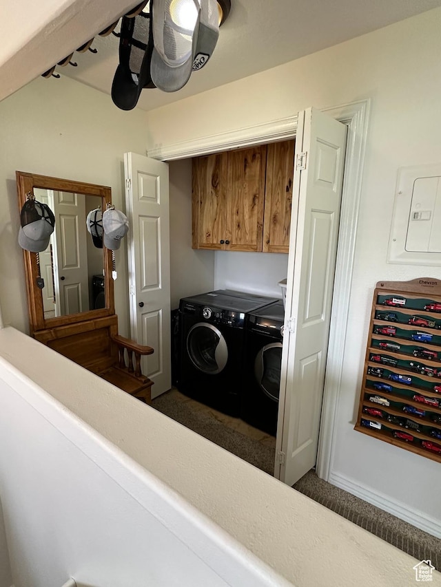 laundry room with separate washer and dryer, cabinet space, electric panel, and dark carpet