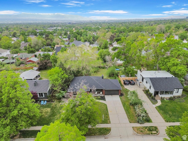 birds eye view of property with a residential view