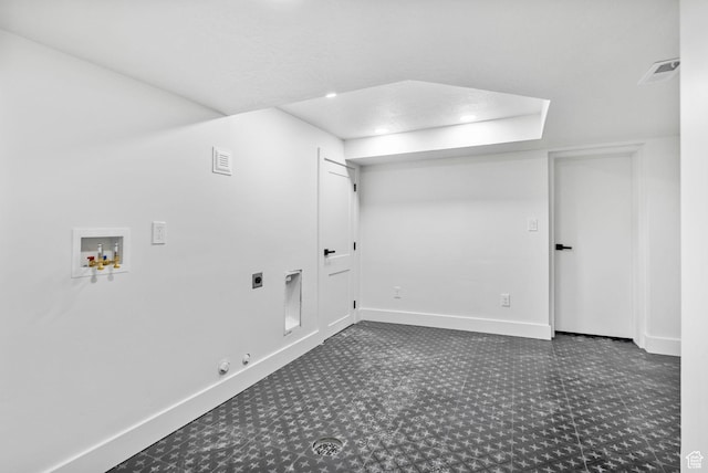 laundry area with hookup for a gas dryer, washer hookup, baseboards, and hookup for an electric dryer