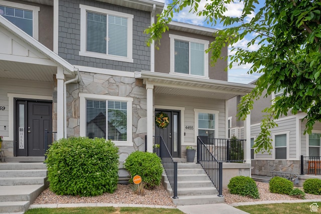 4455 W Glendon Dr, Lehi, UT 84043 - view of front of home with stone siding and covered porch