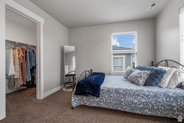 4455 W Glendon Dr, Lehi, UT 84043 - carpeted bedroom featuring a closet, visible vents, baseboards, and a spacious closet