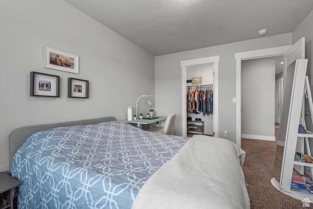 4455 W Glendon Dr, Lehi, UT 84043 - carpeted bedroom with baseboards, a closet, and a walk in closet