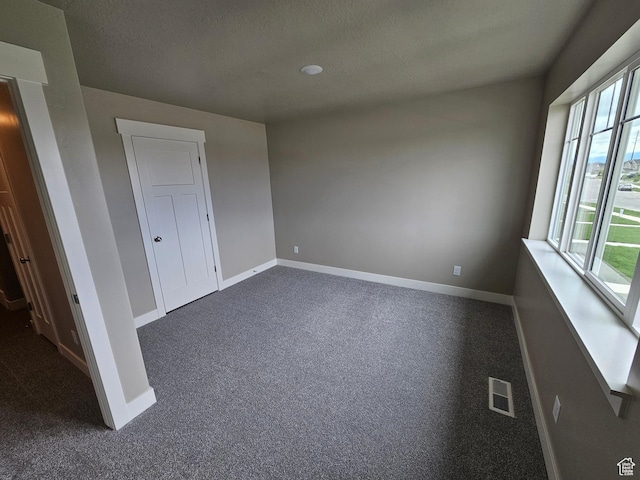 518 N 1400 W Lot 26, Springville, UT 84663 - unfurnished bedroom with visible vents, baseboards, and dark carpet