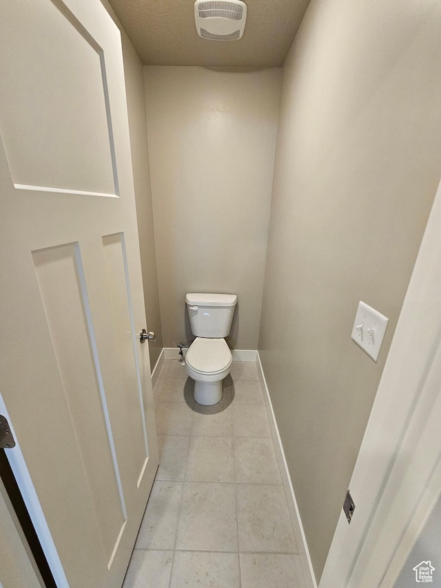 518 N 1400 W Lot 26, Springville, UT 84663 - bathroom featuring baseboards, toilet, tile patterned flooring, and visible vents